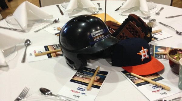 Photo: Helmet and baseball cap used for table centerpiece