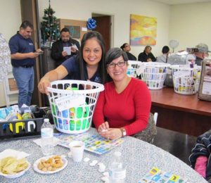 Photo: BCFS Staff Member with Loteria Event Participant