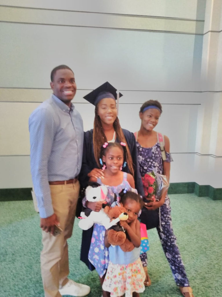 Latika and her family during graduation